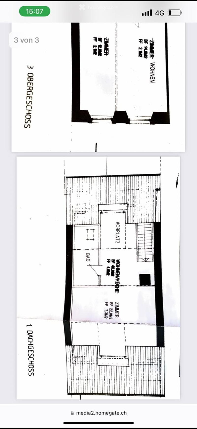 Floor plan showing two levels: ground floor with living room, kitchen, bedroom, and bathroom; upper floor with two bedrooms.