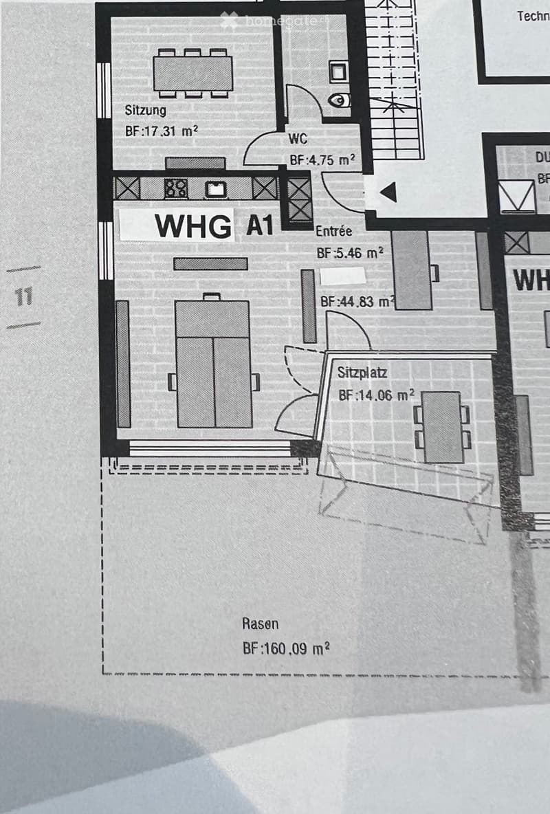 Floor plan of a residential unit labeled WHG A1, including a sitting area, WC, entrance, and a dining area on the ground floor.