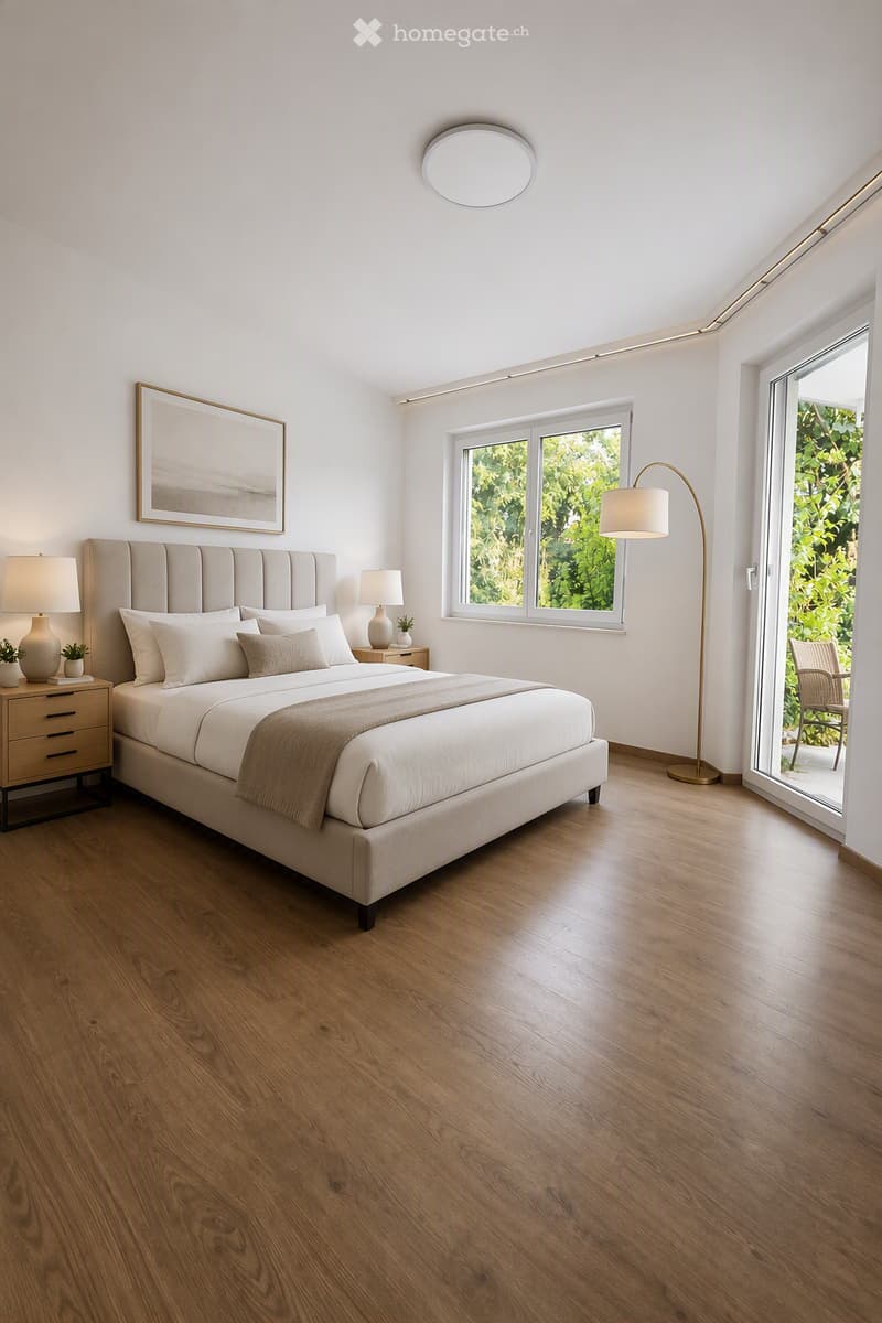 Modern bedroom with a large bed, nightstand, lamps, and a view of greenery through large windows and a sliding glass door.