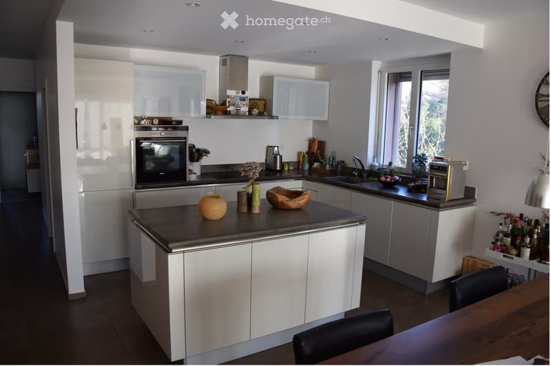 {"type": "Kitchen", "objects": ["oven", "sink", "faucet", "cabinets", "countertop", "chair", "table", "vase", "bowl", "faucet", "fridge", "cupboard", "bottle", "fridge", "cupboard", "cupboard", "cupboard", "cupboard", "cupboard", "cupboard", "cupboard", "