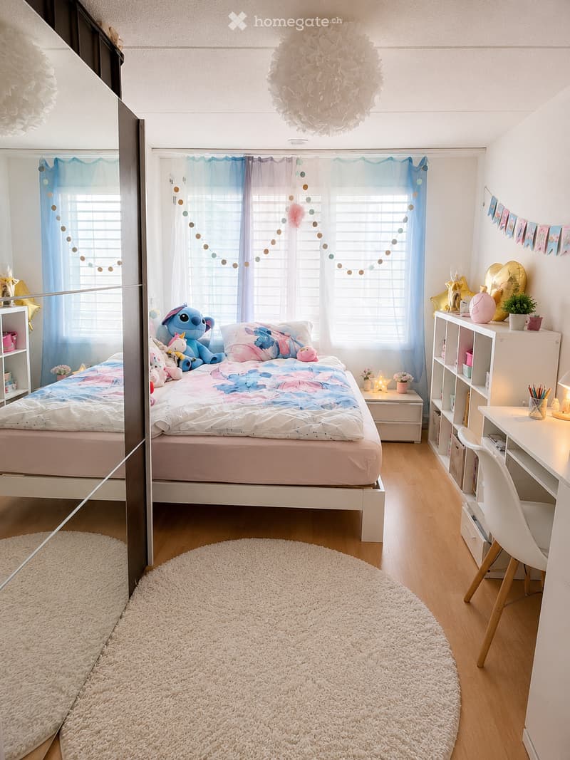 A well-lit bedroom with a bed, nightstand, desk, chair, shelf, and decorative items including a balloon and a potted plant. The room features a round white rug, colorful curtains, and a decorative string light garland.