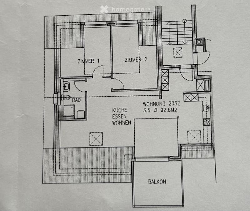 Floor plan showing a kitchen, dining area, living area, two bedrooms, a bathroom, and a balcony.