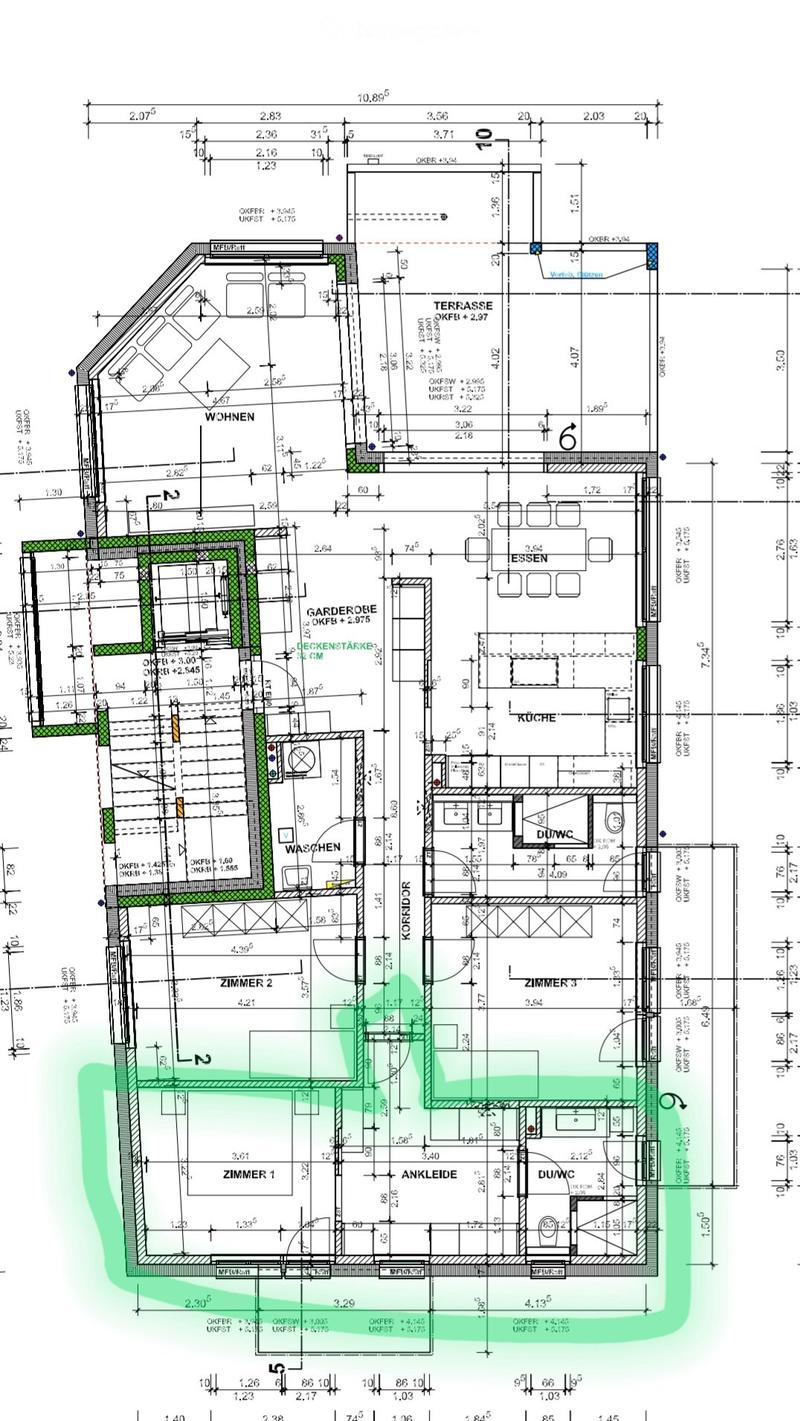 Floor plan of a residential unit with labeled rooms including living area, kitchen, bedrooms, bathrooms, and a terrace.
