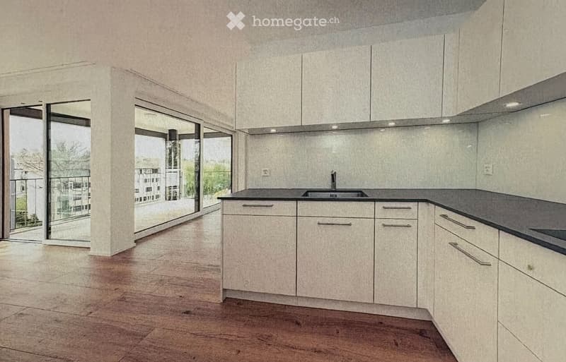 Modern kitchen with white cabinets, dark countertops, and a sink, featuring large windows with a view of the outside.