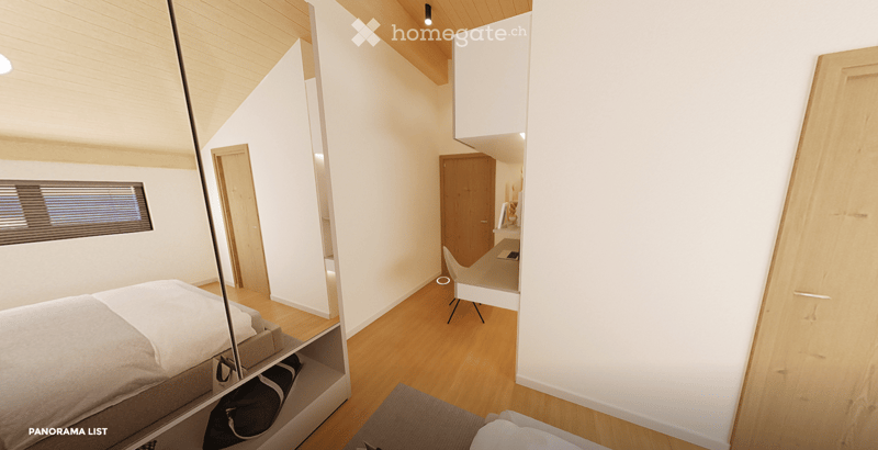 Modern, minimalist bedroom with a large bed, built-in storage, a sleek chair, a mirror, and a small desk area with a chair.