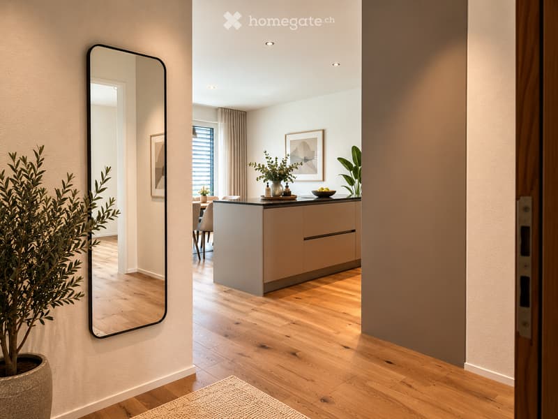 Modern hallway leading to a kitchen area with a kitchen island, chairs, a mirror, and decorative plants.
