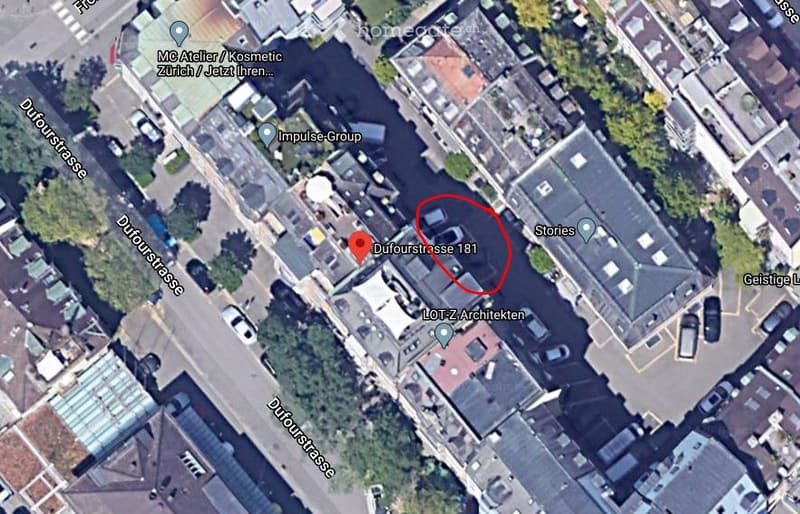 Aerial view of a city block showing a building at Dufourstrasse 181, surrounded by other structures, roads, and greenery.