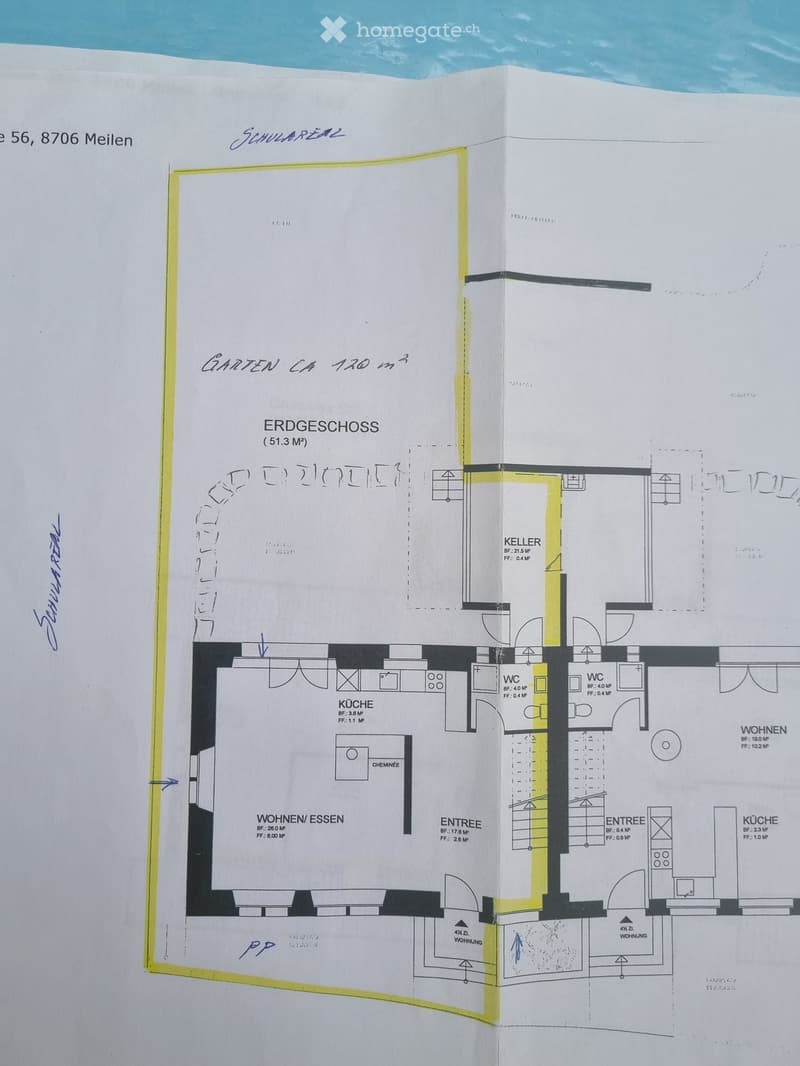 Floor plan of a house with a ground floor (51.3 m²) including a kitchen, living/dining area, entrance, two bathrooms, and a basement (21.5 m²).