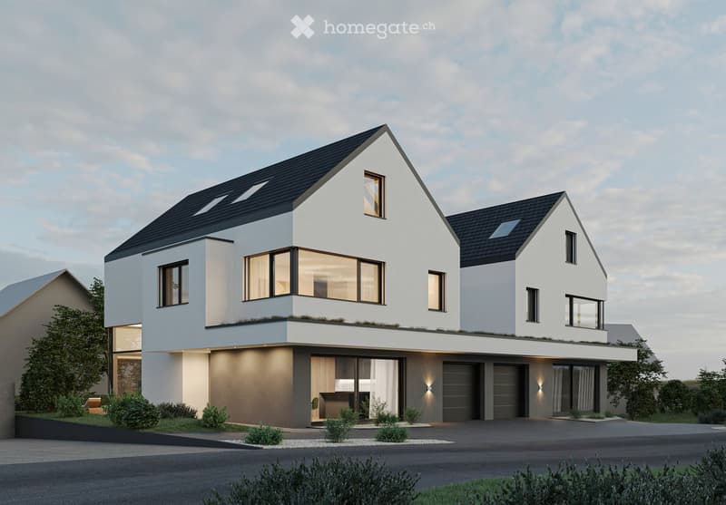 Modern two-story house with white and grey exterior, large windows, flat roof, and integrated garage.