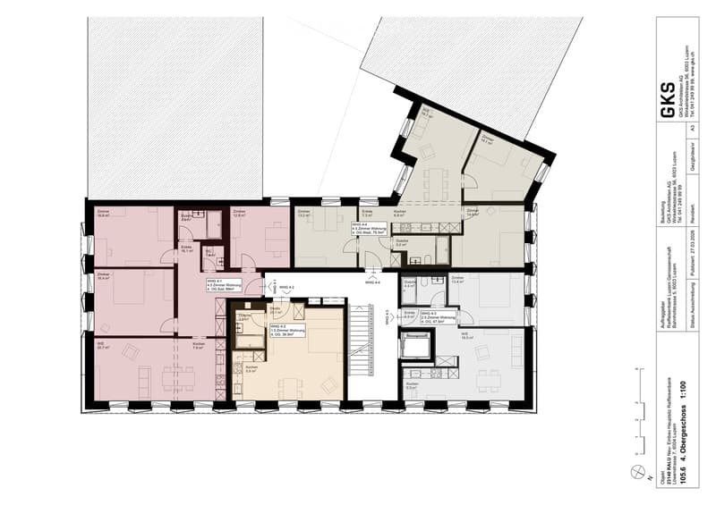 Floor plan of a multi-unit residential building with multiple apartments, kitchens, bathrooms, and entrances.