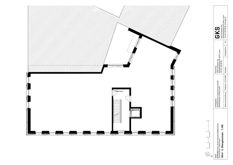 Floor plan of a residential unit featuring a living room, kitchen, two bedrooms, two bathrooms, and a staircase leading to an upper level.