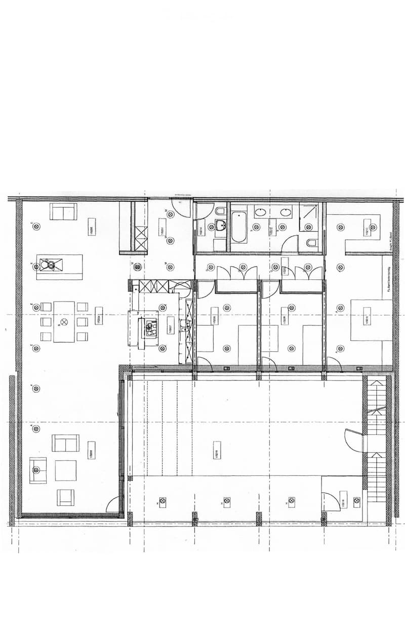 Floor plan of a multi-room residential space with a living area, dining area, kitchen, bedrooms, bathrooms, and a hallway.
