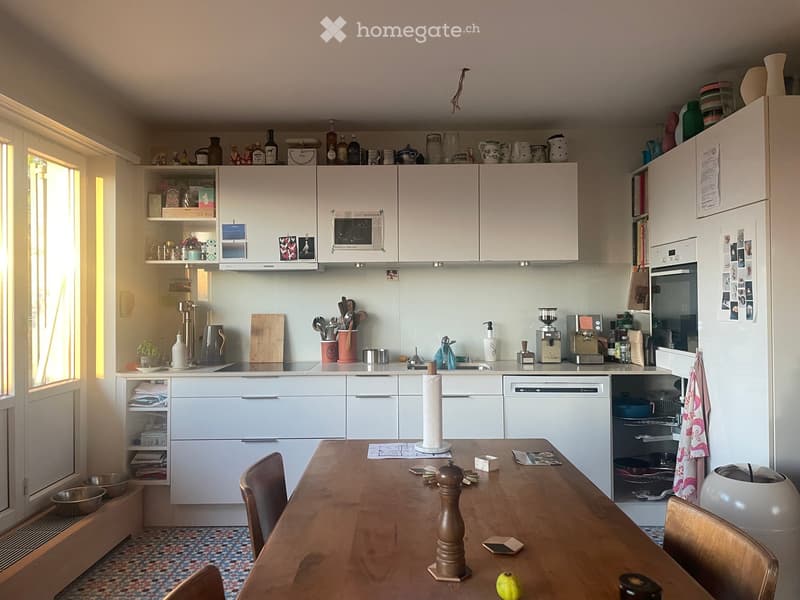 {"type": "Kitchen", "objects": ["refrigerator", "oven", "dishwasher", "microwave", "coffee maker", "table", "chair", "cupboard", "sink", "faucet", "bottle", "cup", "bowl", "pot", "pan", "spoon", "knife", "towel", "bowl", "cupboard", "cupboard", "cupboard"