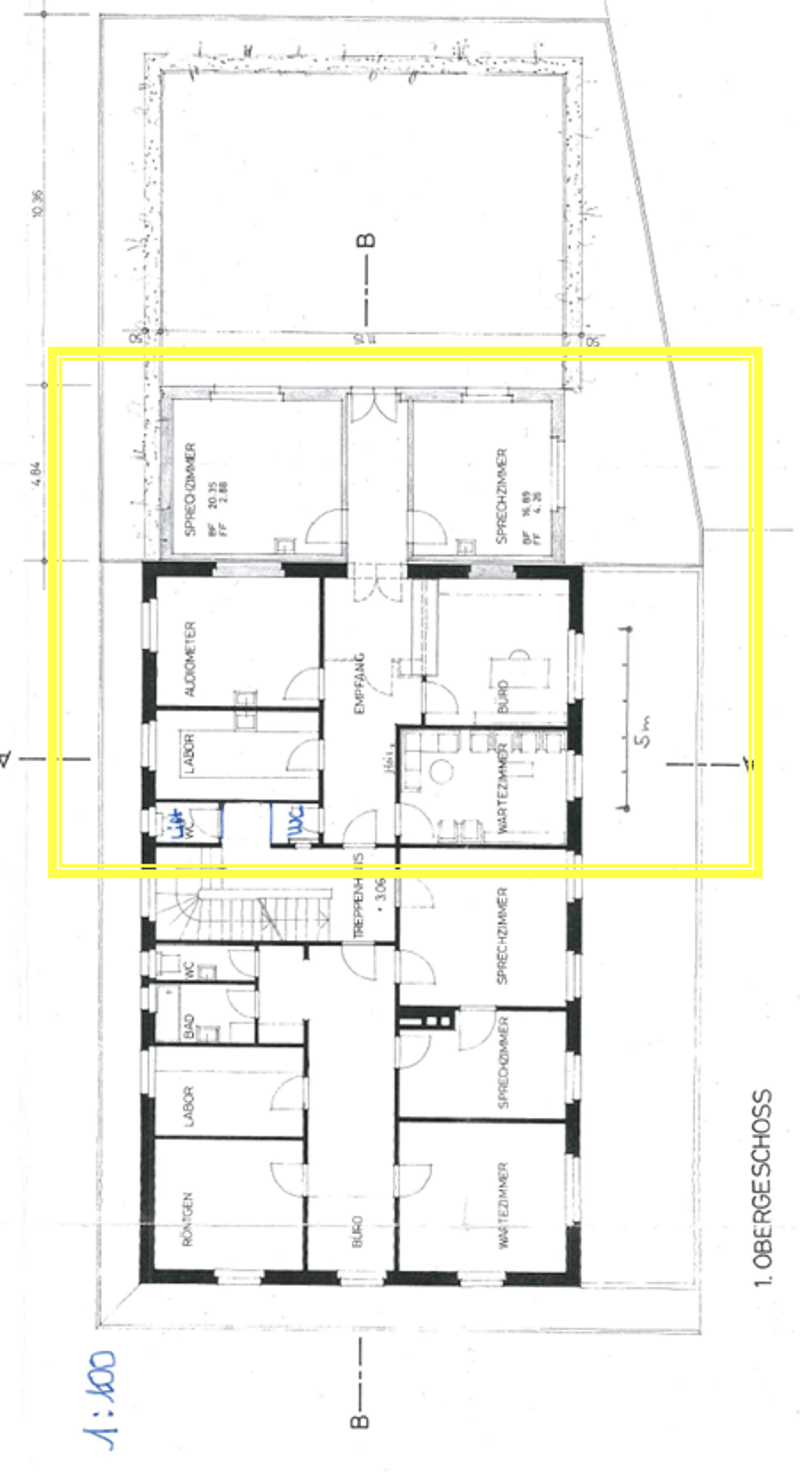 Floor plan of a multi-room building with labeled rooms including a kitchen, living room, bedrooms, bathrooms, and a garage.