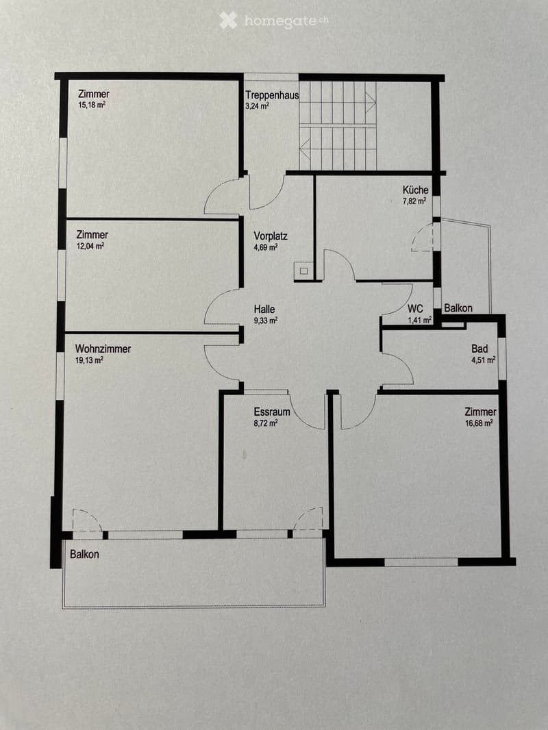 Floor plan showing a living room, kitchen, 2 bedrooms, 2 bathrooms, hallway, entrance area, staircase, and balcony.