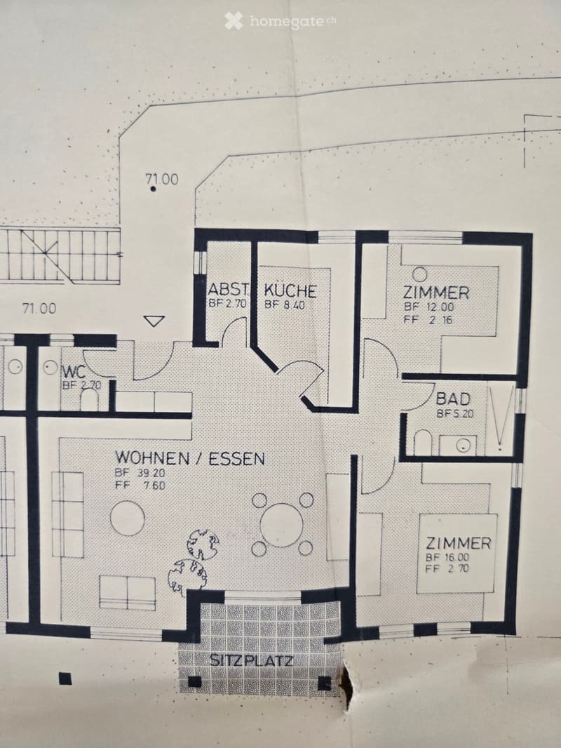 Floor plan showing a layout with rooms labeled in German: kitchen, living/dining area, bathroom, bedroom, and WC.