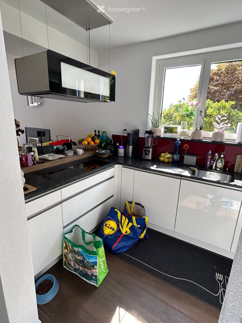 {"type": "Kitchen", "objects": ["refrigerator", "microwave", "blender", "coffee maker", "sink", "cabinets", "countertop", "faucet", "cupboard", "bowl", "bottle", "cup", "bowl", "bowl", "cup", "cup", "cup", "cup", "cup", "cup", "cup", "cup", "cup", "cup",