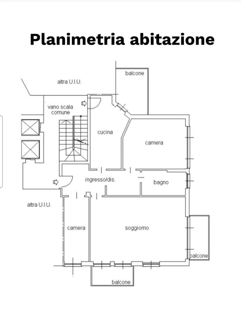 Floor plan of a residential unit showing a kitchen, two bedrooms, a bathroom, a living room, and three balconies.