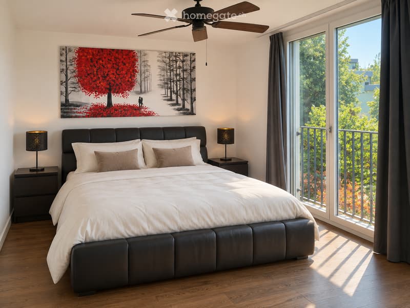 Modern bedroom with a large bed, nightstands, lamps, and a large window with a view of greenery.