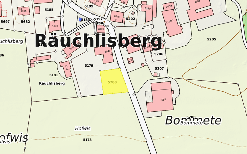 Floor plan map of the Räuchlisberg area, showing various plots and buildings with numbered labels.
