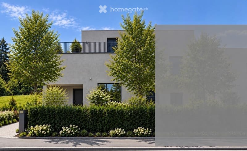 Modern two-story house with a balcony, surrounded by greenery and a well-maintained garden.