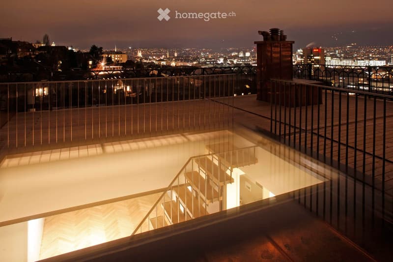 glass floor, metal railing, wooden deck, staircase, city view