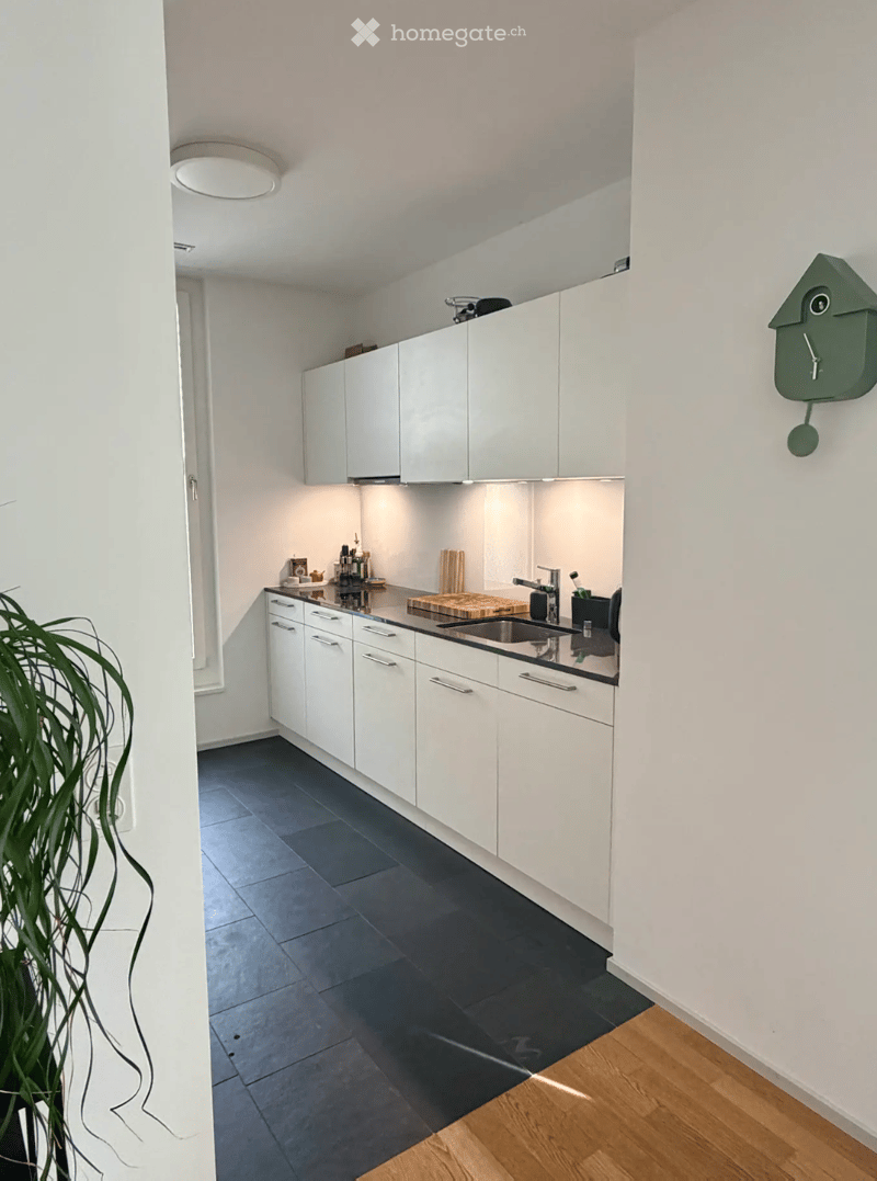 {"type": "Kitchen", "objects": ["cabinets", "sink", "faucet", "cutting board", "faucet", "faucet handle", "faucet sprayer", "faucet sprayer handle", "faucet sprayer hose", "faucet sprayer nozzle", "faucet sprayer sprayer", "faucet sprayer sprayer handle",