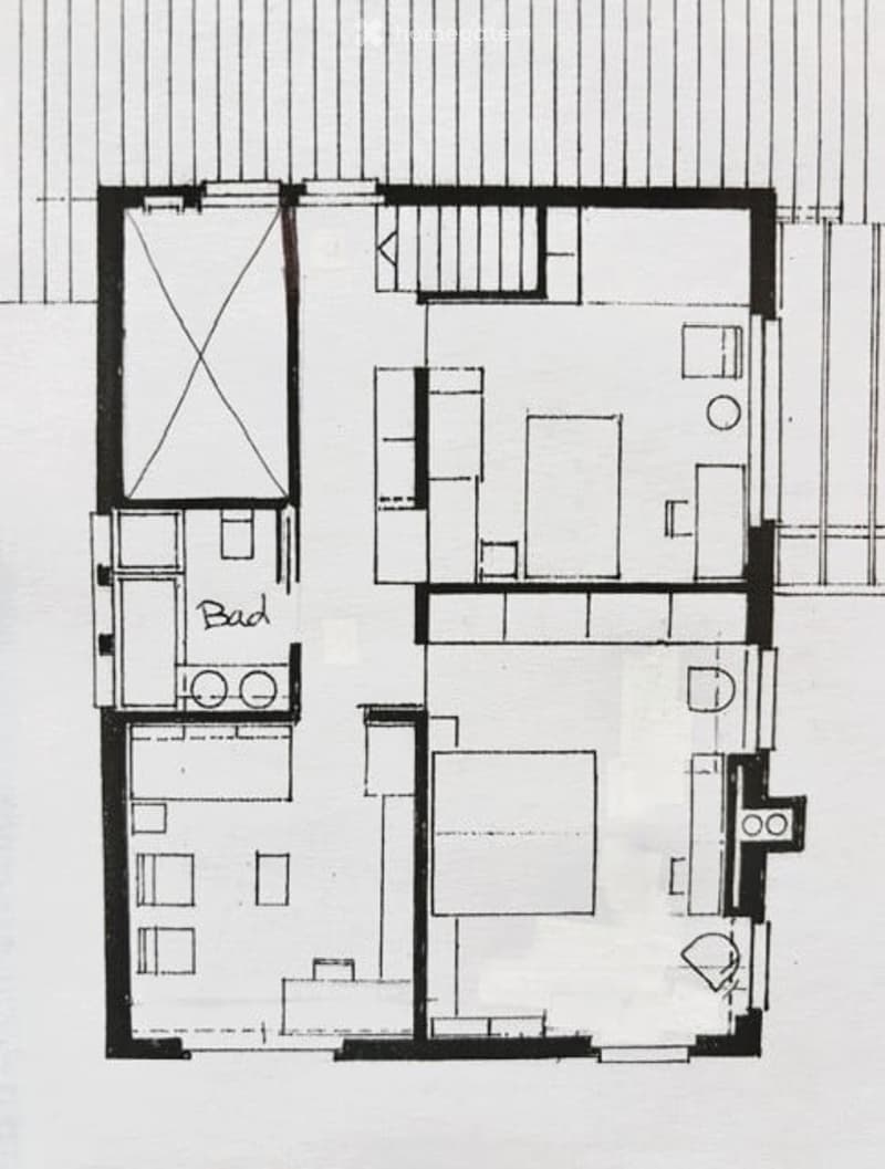 Floor plan of a small apartment with a living room, kitchen, bedroom, and bathroom. The layout includes a hallway leading to the bedroom and bathroom, with a small closet near the entrance.