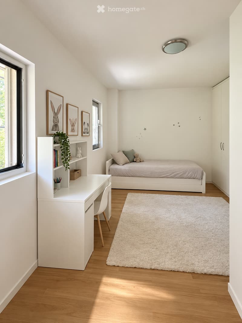 A modern, well-lit bedroom with a bed, desk, chair, bookshelf, plant, picture frames, and a soft white rug on a wooden floor.