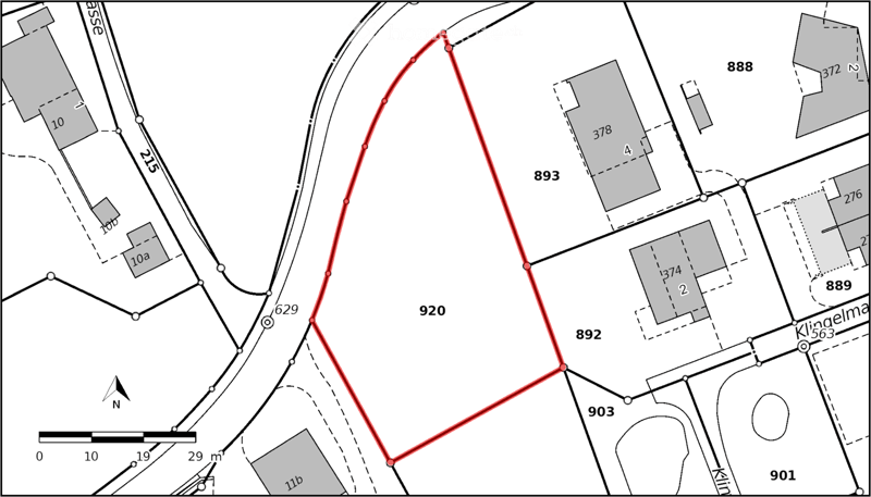 Floor plan showing a property plot with labeled sections and boundaries, including numbered lots and surrounding structures.