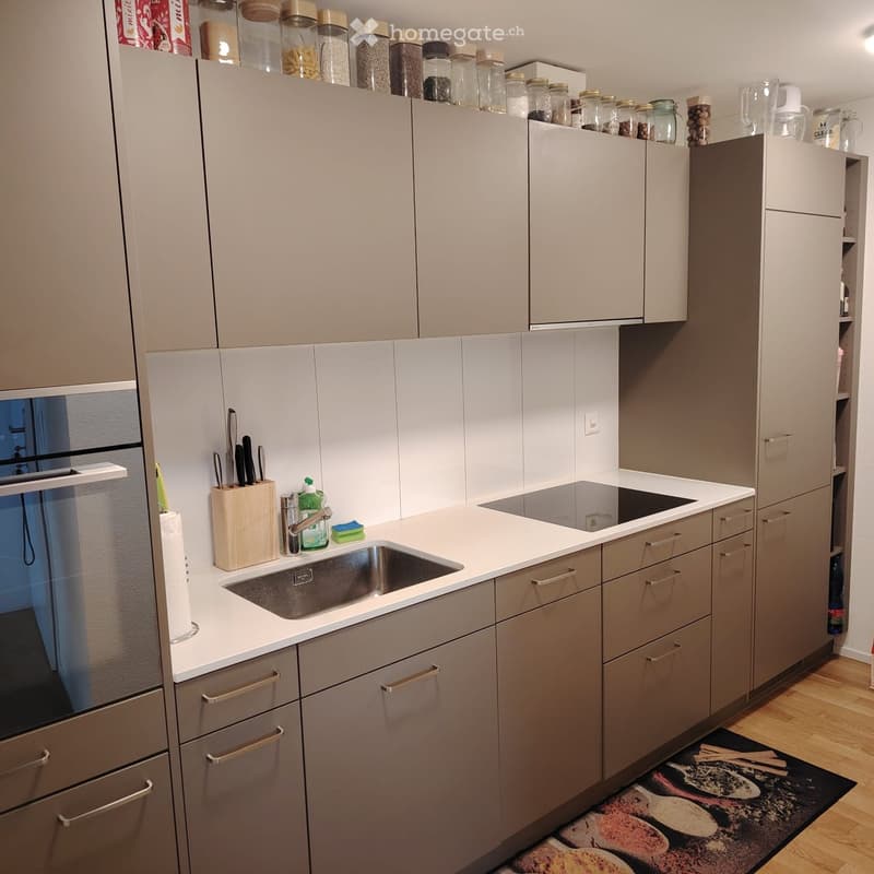 {"type": "Kitchen", "objects": ["sink", "faucet", "knife block", "oven", "cabinets", "cupboard", "fridge", "cupboard", "cupboard", "cupboard", "cupboard", "cupboard", "cupboard", "cupboard", "cupboard", "cupboard", "cupboard", "cupboard", "cupboard", "cup