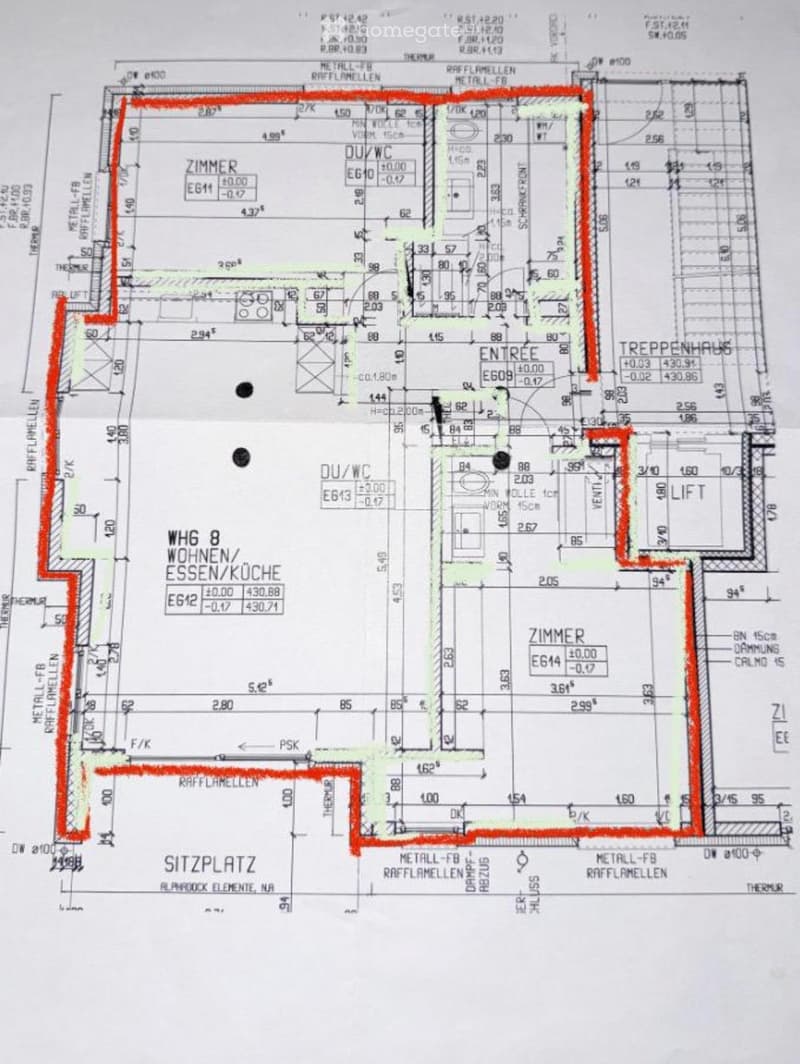 Floor plan showing a multi-room layout including a living room, kitchen, bedrooms, bathrooms, entrance, staircase, and seating area.