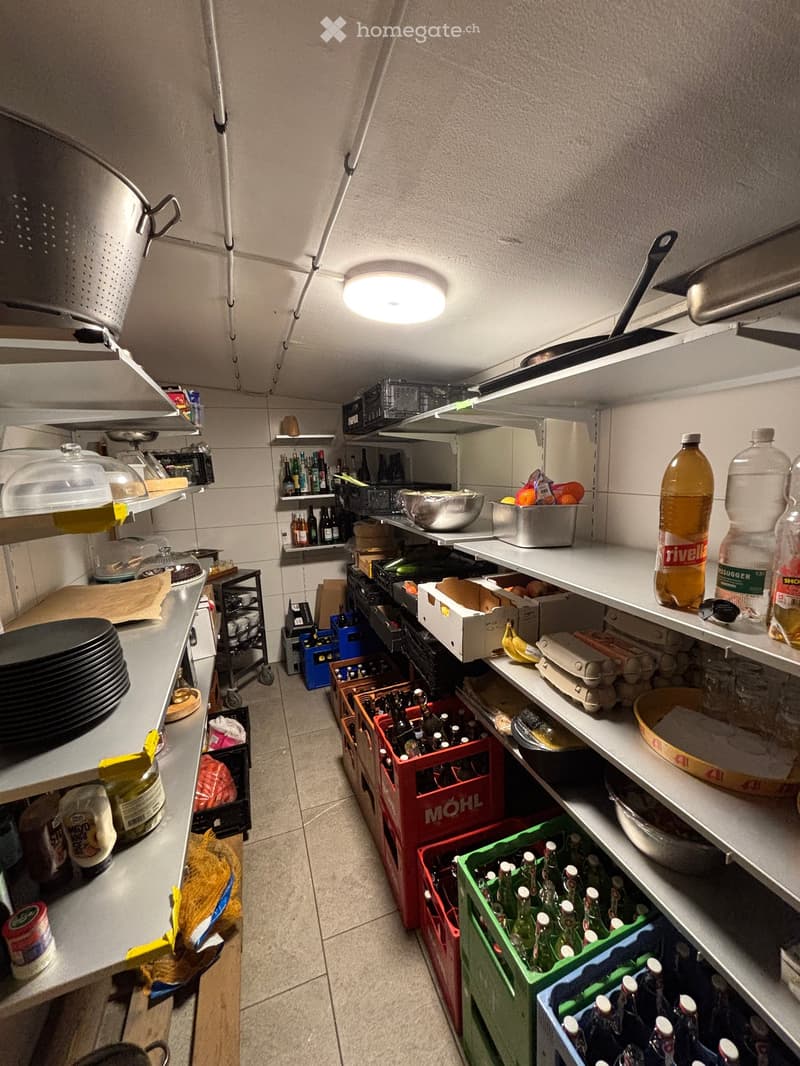 {"type": "Kitchen", "objects": ["shelves", "bottled drinks", "plates", "crisper", "wine bottles", "eggs", "fridge", "cupboard", "fridge", "cupboard", "cupboard", "cupboard", "cupboard", "cupboard", "cupboard", "cupboard", "cupboard", "cupboard", "cupboard