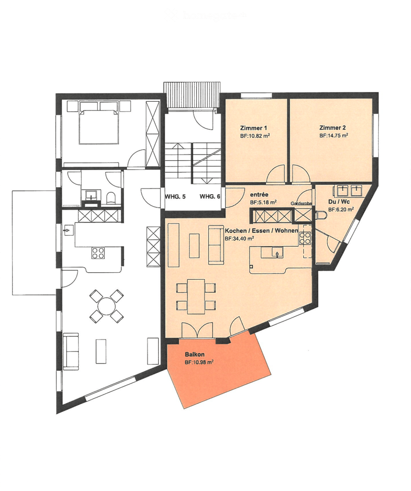 Floor plan showing a kitchen/dining/living area, two bedrooms, a bathroom, entrance, and a balcony.