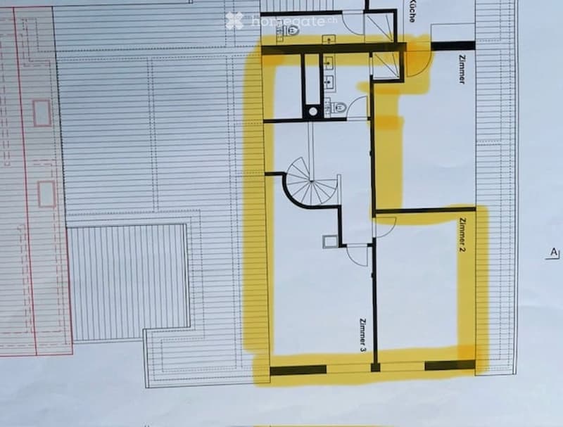 Floor plan of a residential space with three rooms, a hallway, and a small entryway. The layout includes labeled rooms and a staircase leading to an upper level.