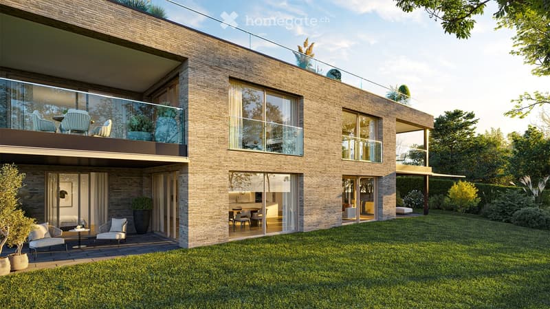 Modern two-story house with brick facade, large windows, and balconies. Features include a well-maintained lawn, outdoor seating areas, and contemporary design elements.