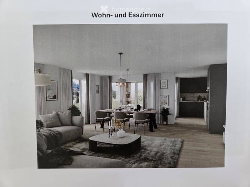 Open-plan living and dining area with a grey sofa, coffee table, dining table with chairs, pendant lights, and a modern kitchen area visible in the background.