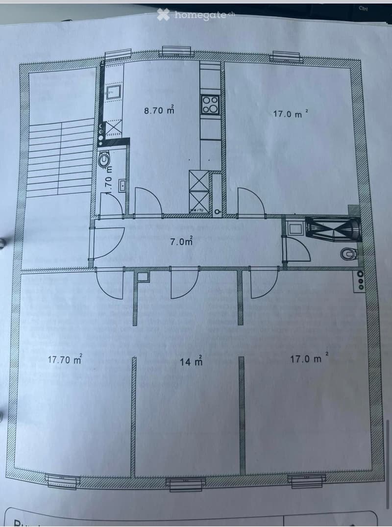 Floor plan showing a layout with multiple rooms and areas, including a living space, bedroom, bathroom, and hallway.