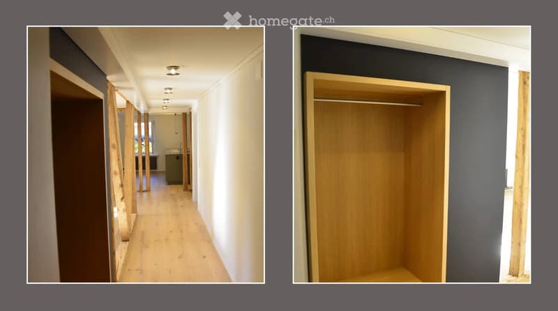 A long, narrow hallway with light wooden flooring, white walls, and recessed ceiling lights. The hallway leads to an open area with a visible closet and a glimpse of a room with a sink and cabinetry.