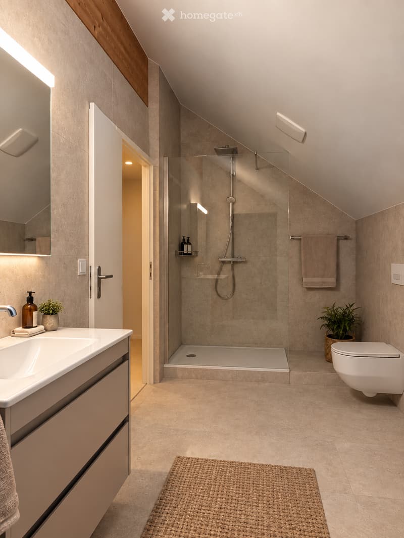 Modern bathroom with a white sink, mirror, toilet, and glass-enclosed shower. Beige tiles, built-in cabinetry, and decorative plants are visible.