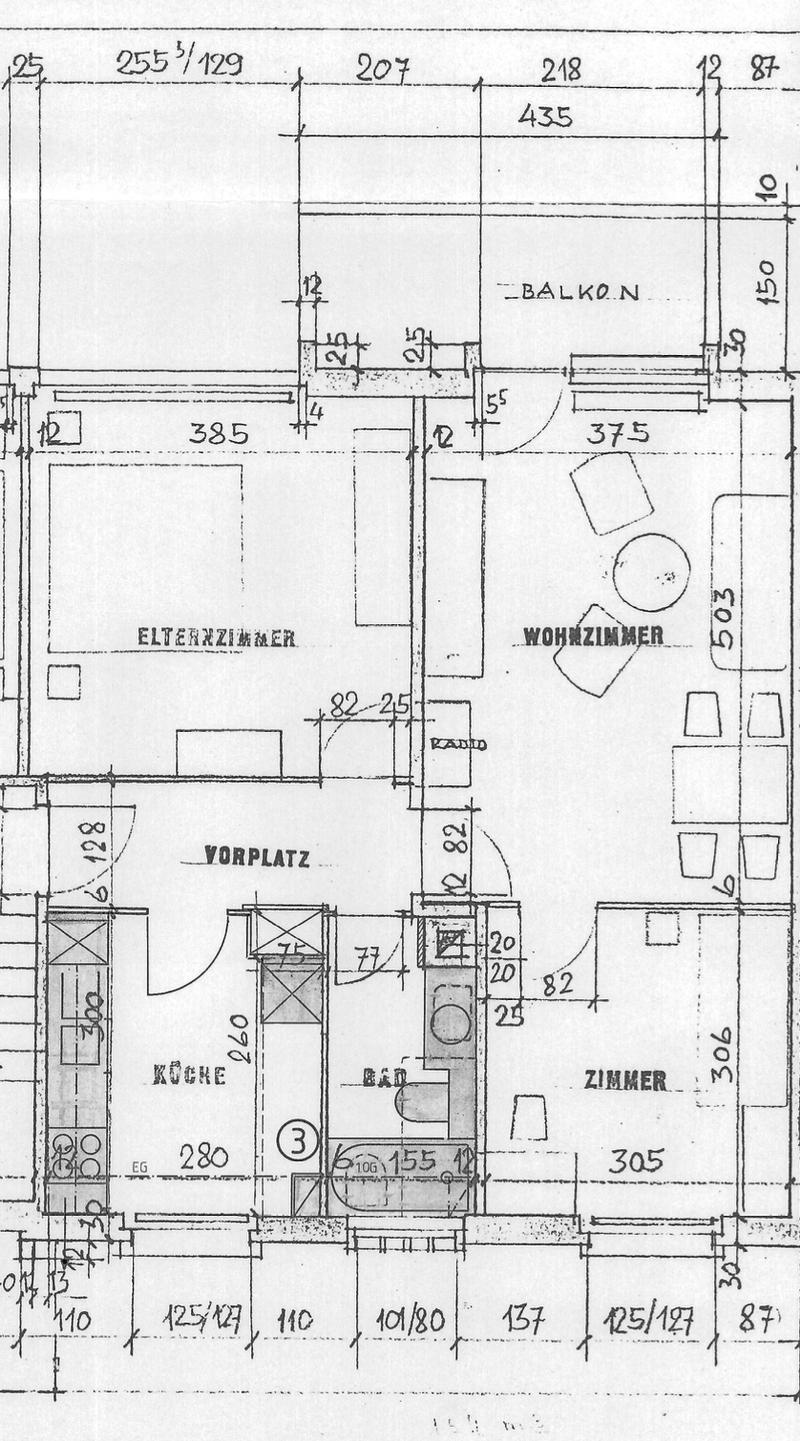 Floor plan showing a living room, kitchen, bedroom, bathroom, hallway, and balcony.