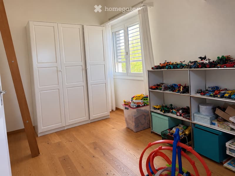 {"type": "Furnished Room", "objects": ["shelf", "toy car", "toy truck", "toy van", "toy airplane", "toy train", "toy motorcycle", "toy helicopter", "toy boat", "toy bus", "toy tractor", "toy bicycle", "toy scooter", "toy robot", "toy spaceship", "toy subm