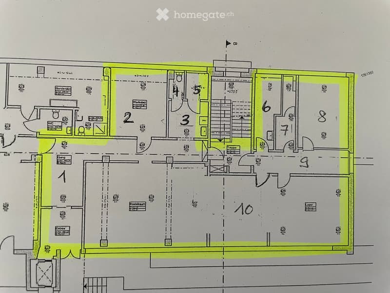 Floor plan showing a multi-room layout including a living room, kitchen, bedrooms, bathrooms, and a garage.