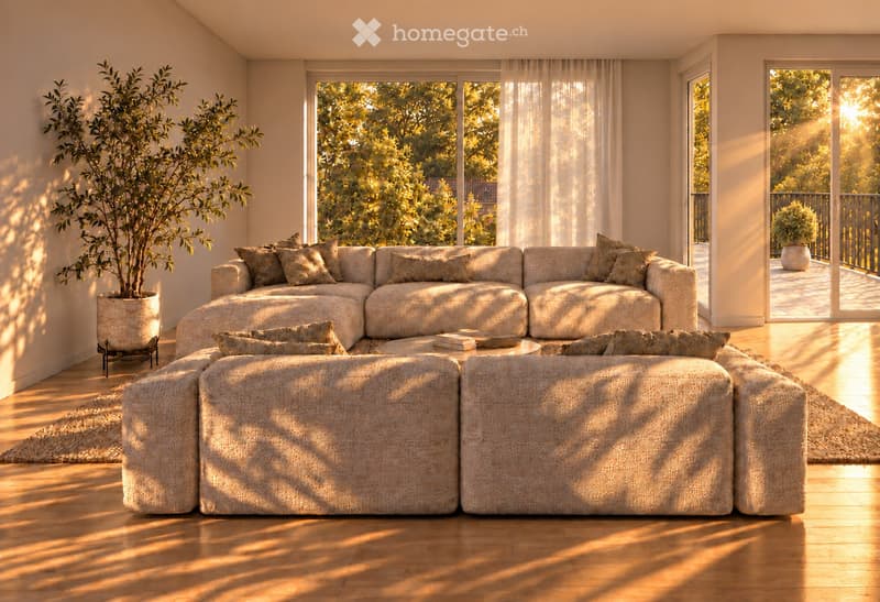 Bright living room with large windows and sliding glass doors leading to a balcony, featuring a sectional sofa, coffee table, and potted plants.