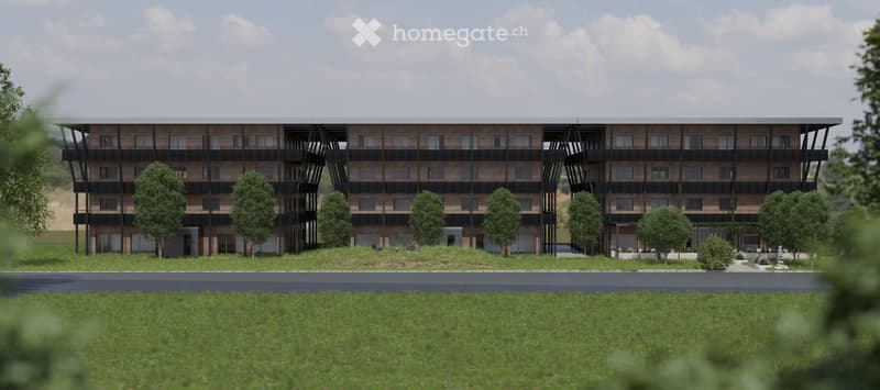 Modern multi-story building with brick facade, multiple balconies, and surrounding greenery.