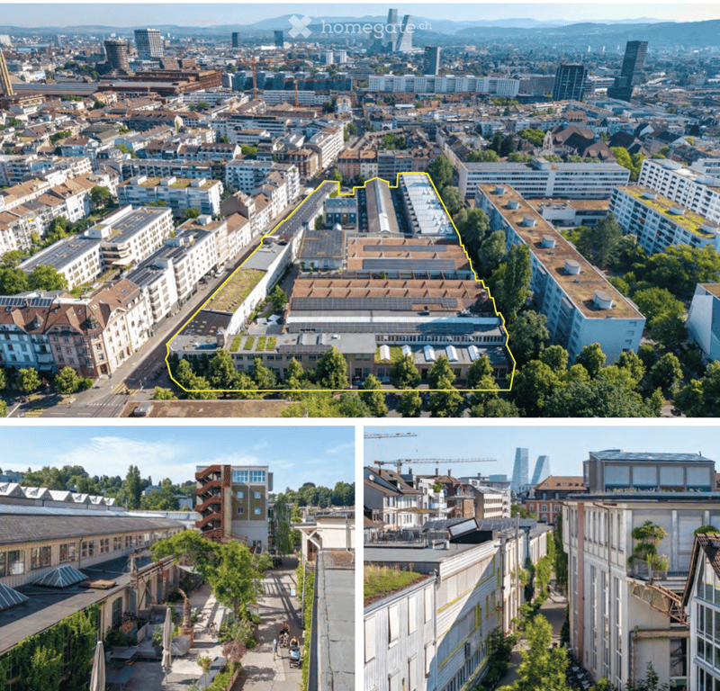 Aerial view of a dense urban area with multiple buildings, green spaces, and a highlighted section outlined in yellow. The scene includes a mix of residential and commercial structures, with visible greenery and a distant skyline.