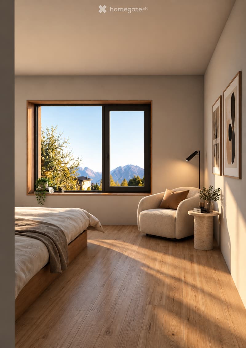 Bright bedroom with wooden flooring, large window offering a scenic mountain view, a bed, a chair, a small table, and decorative items.