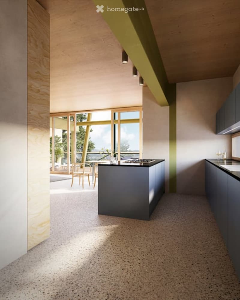 Modern kitchen with a central island, dark cabinets, and a large window overlooking a balcony area with outdoor seating.