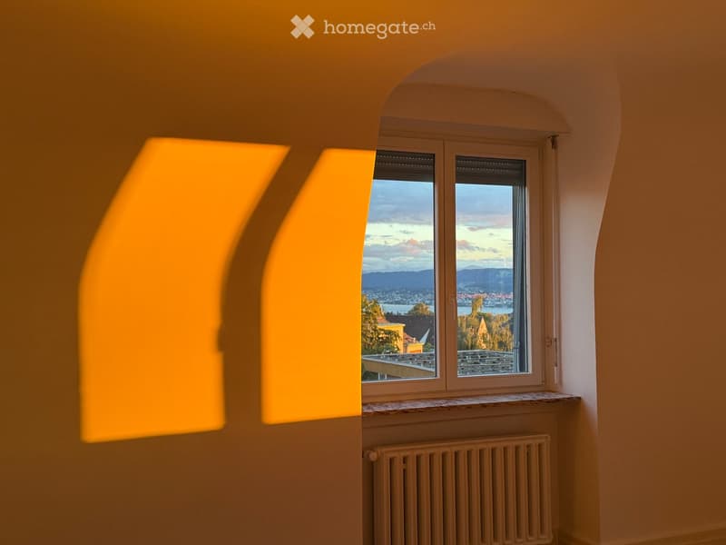white painted wall, arched window, shadow of the curtains, heater, beautiful view outside