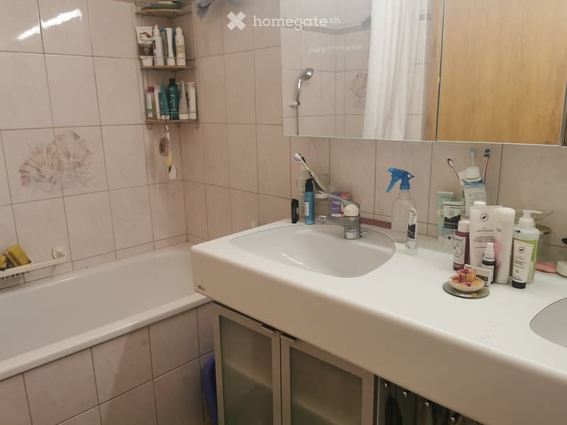{"type": "Bathroom", "objects": ["sink", "faucet", "toothbrush", "toothpaste", "bottle", "mirror", "bathtub", "shower", "shelf", "cup", "bottle", "bottle", "bottle", "bottle", "bottle", "bottle", "bottle", "bottle", "bottle", "bottle", "bottle", "bottle",